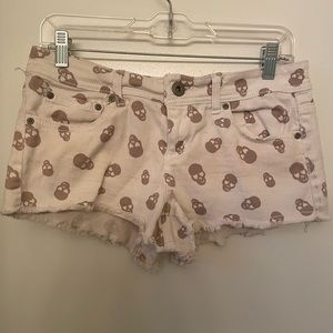 White jean shorts with skulls